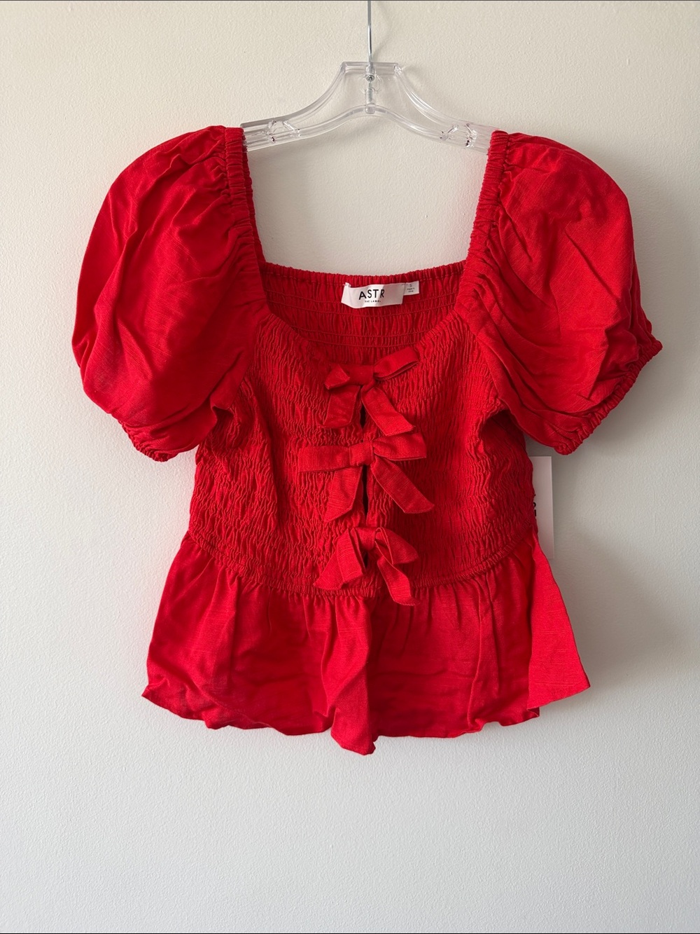 ASTR the Label Darlene Vibrant Red Puff Sleeve Smocked Peplum Top w/Bows S NWT